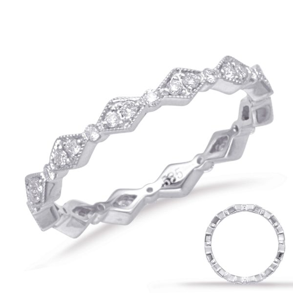 A silver, diamond-studded ring with a zigzag design is displayed prominently, accompanied by a smaller circular ring with square diamond accents.