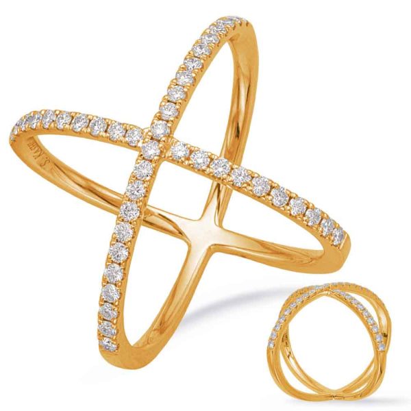 A gold ring featuring a cross design adorned with small diamonds is displayed alongside a simpler ring.