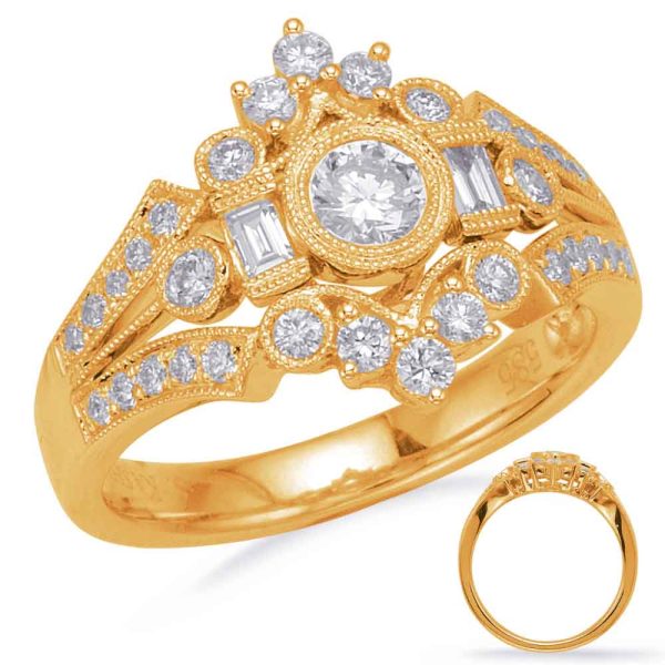 A gold engagement ring features intricate designs and multiple round and rectangular diamonds set on a textured band.