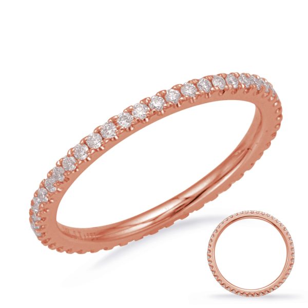 Rose gold ring with a row of diamonds set along the band.