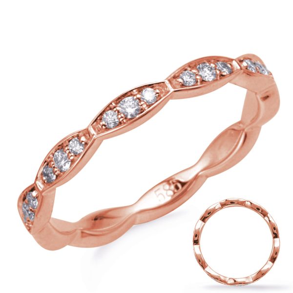 A rose gold ring with a wavy design featuring small embedded diamonds is displayed.