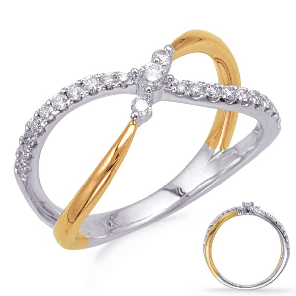 A silver and gold ring with a twisted design features a central diamond surrounded by smaller diamonds on one side.