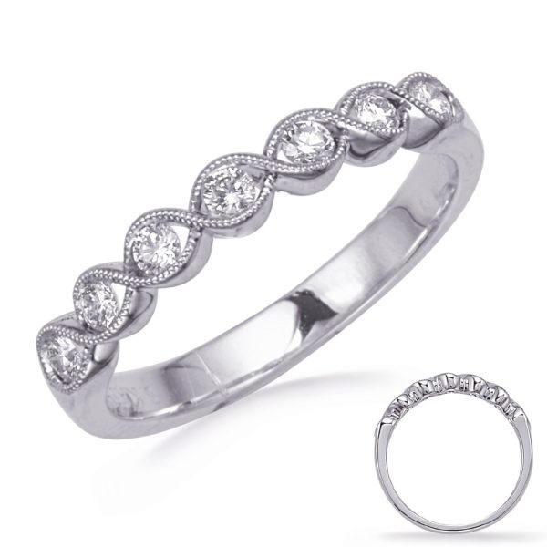 A silver ring featuring a wavy design adorned with small diamonds along its band.