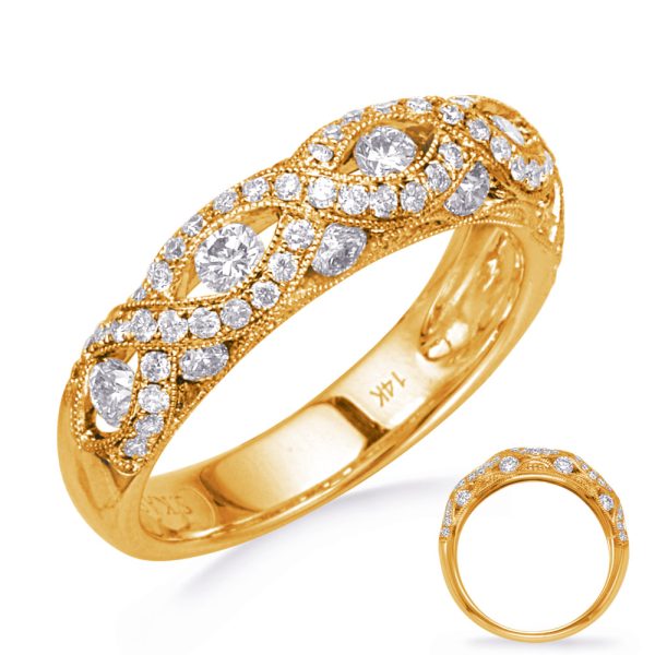 A gold ring featuring a twisting design embedded with multiple clear gemstones.