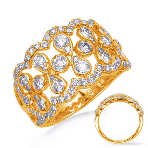 A gold ring with a detailed design featuring multiple diamonds is displayed from different angles.