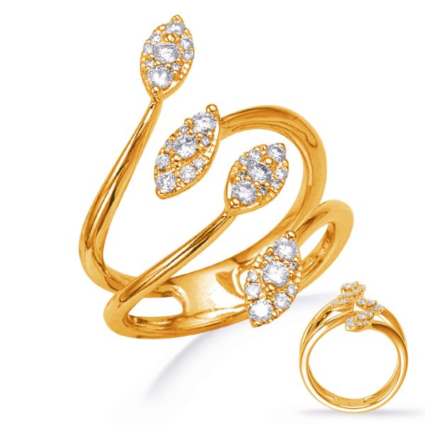 A gold twisted ring with three leaf-shaped designs, each adorned with multiple clear gemstones, is displayed.