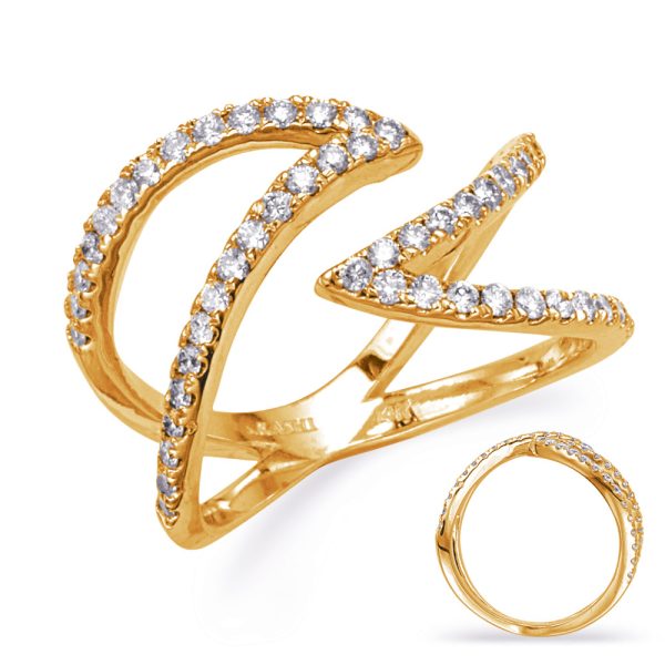 A gold ring featuring a swirling design adorned with clear gemstones.