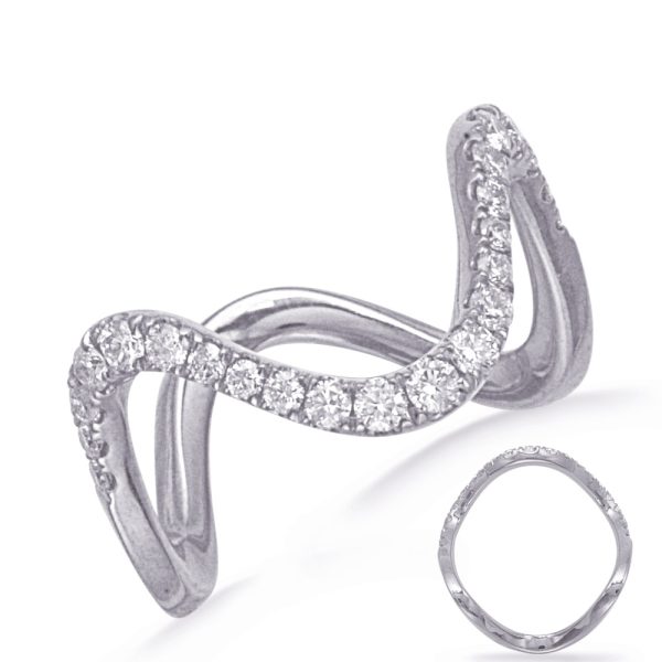 Silver ring with a wavy design and small diamonds embedded along the top, displayed on a light background.