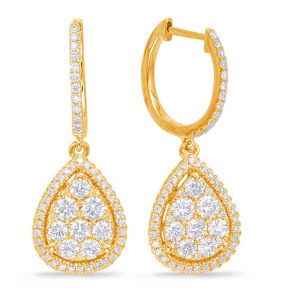 Gold teardrop earrings encrusted with small diamonds hang displayed on a plain background.