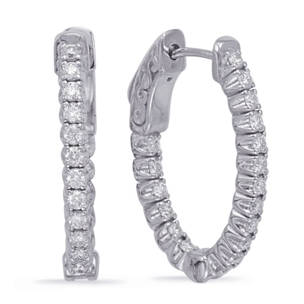 Silver hoop earrings with a row of small, sparkling diamonds are displayed at an angle.