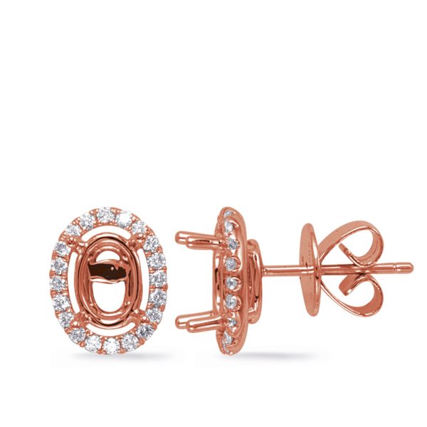 Rose gold earrings with a circular design and clear stones are displayed together, showcasing their intricate details.
