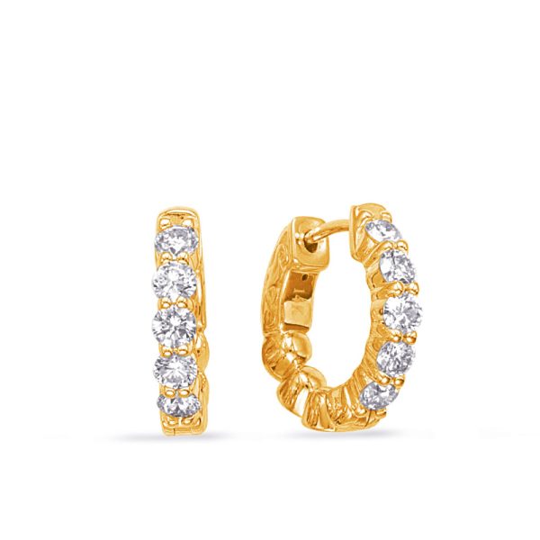 Gold hoop earrings featuring several sparkling diamonds are displayed side by side.