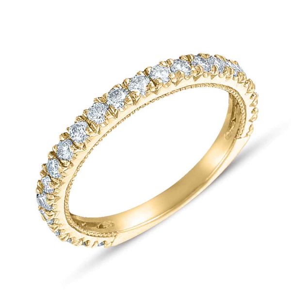 A gold ring with a row of small diamonds set around the band is shown.