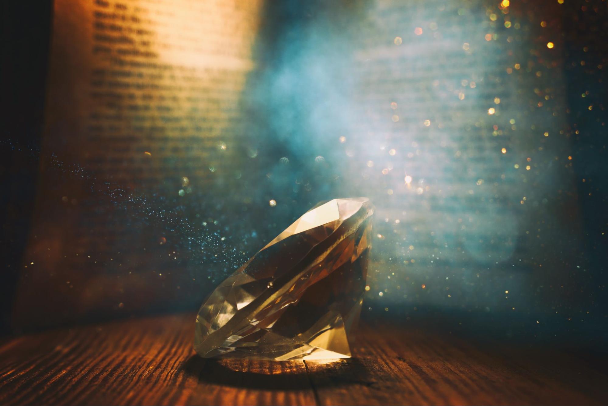 A diamond in front of a history book